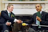 thumbnail: U.S. President Barack Obama holds a book of poetry by William Butler Yeats given to him by Ireland's Prime Minister Enda Kenny (L) during their meeting in the Oval Office as part of a St. Patricks Day visit at the White House in Washington March 17 2015. REUTERS/Jonathan Ernst