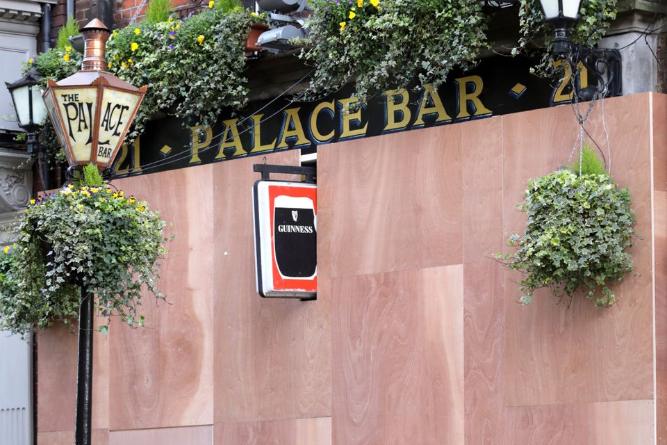The Palace Bar on Dublin's Fleet Street, which temporally closed its doors and boarded up, due to the impact of the Coronavirus