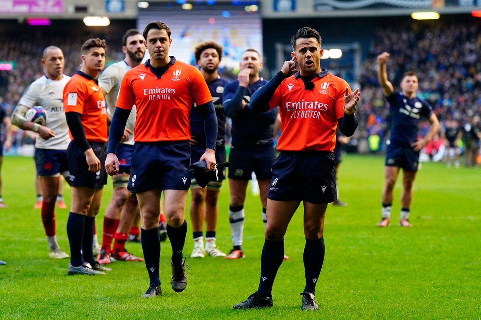 Referee Nic Berry waits for a TMO decision at the end of Scotland's defeat to France. Jane Barlow/PA Wire.