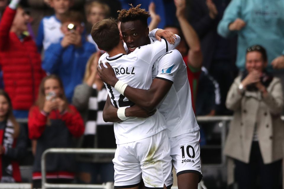 Swansea number 10 Tammy Abraham celebrates scoring his first goal in the Premier League victory against Huddersfield