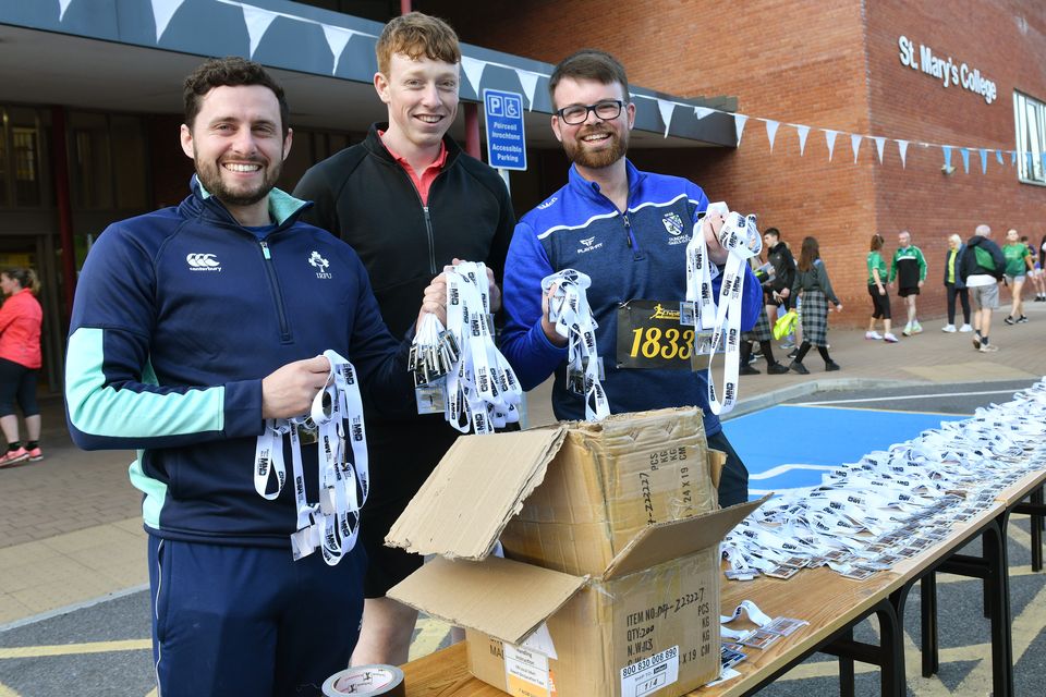 Only 800 medals to sort out....Kevin McGopnigle, Jamie Duffy and Shane McDonnell at the Marist 5K. Photo: Ken Finegan/www.newspics.ie