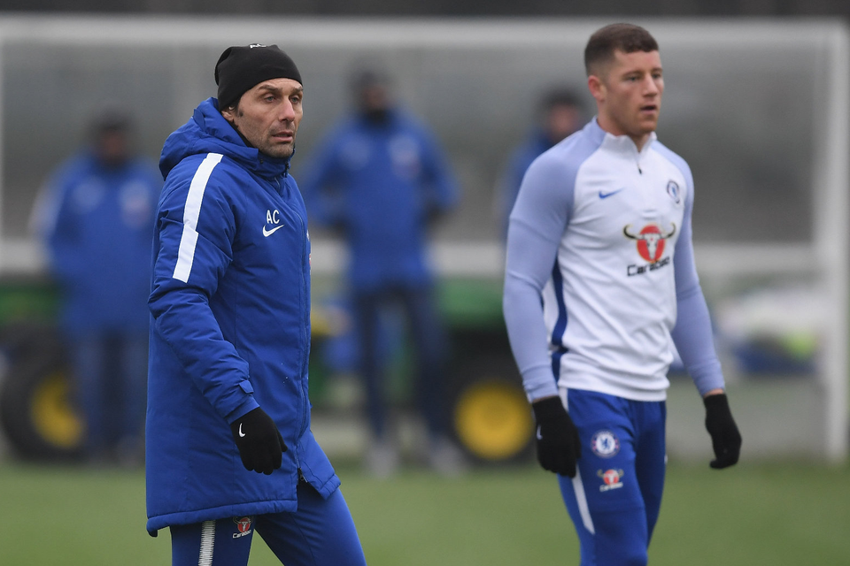 Chelsea boss Antonio Conte pictured at their Cobham training ground yesterday with new signing Ross Barkley, who is still working on his match fitness. Photo: Getty Images