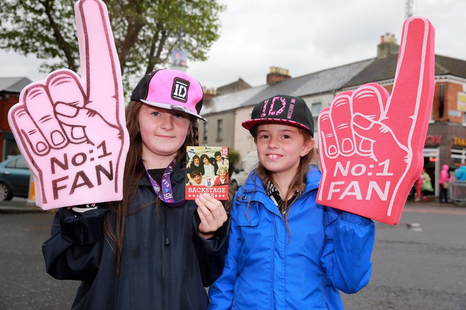 One Direction fans Ava Keane, age 8 and Sarah McGuirk, 9, from Drimnagh in Dublin, on their way to see the band at Croke Park, Dublin.. Picture:Arthur Carron