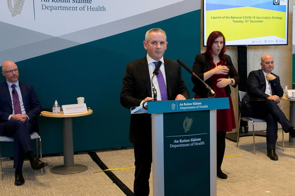 Health Minister Stephen Donnelly, HSE chief Paul Reid and chief medical officer Dr Tony Holohan in December 2020. Photo: Gareth Chaney/Collins