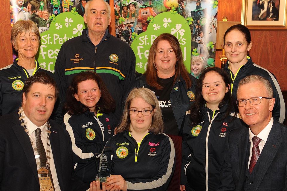 Martina McCarthy, Kerry Stars Special Olympics Group, Best Voluntary Group award, with Cllr Niall Kelleher, Mayor of Killarney, and PJ McGee, Daly's SuperValu, sponsor, at the St. Patrick's Festival Killarney parade prizegiving function in The International Hotel on Tuesday night. Also included are Kathleen Fitzgerald, Vincent Lacke, Clare Rohan, Geraldine Burke, Siobhan Looney and Jane Curran. Picture: Eamonn Keogh