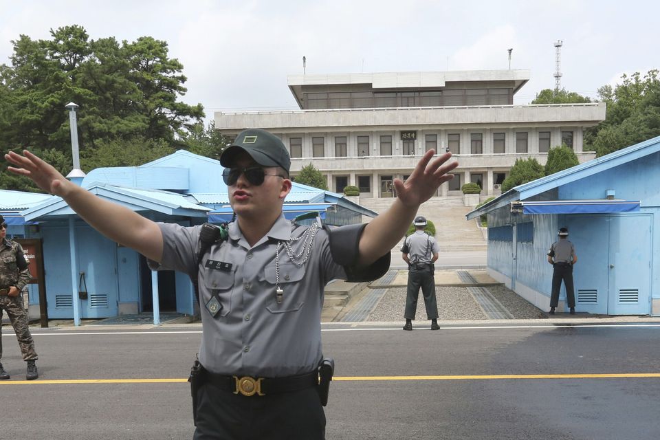 A South Korean army soldier gestures at the border village of Panmunjom in Paju, South Korea (Stock image - AP)