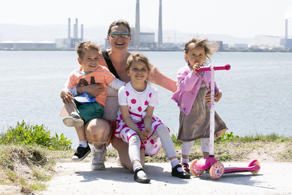Svetlana Chakarova from Clontarf and her children Liam and Liah (3) and Alice (5) enjoying the good weather at Dollymount, Dublin. Photo: Gareth Chaney/Collins Photos