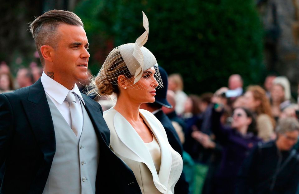Robbie Williams and Ayda Field arrive ahead of the wedding of Princess Eugenie to Jack Brooksbank at St George's Chapel in Windsor Castle