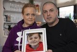 thumbnail: Seamus Beasley and his partner Maeve Fitzgerald with a picture of their son Padraig, who died aged 11 of Neuroblastoma cancer. Photo: Domnick Walsh