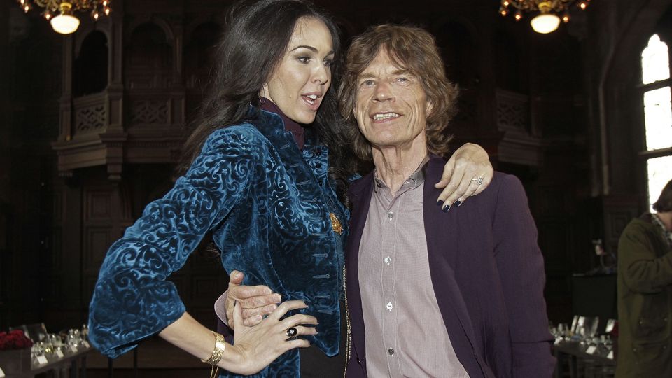 L'Wren Scott and Sir Mick Jagger, pictured in 2012 (AP)