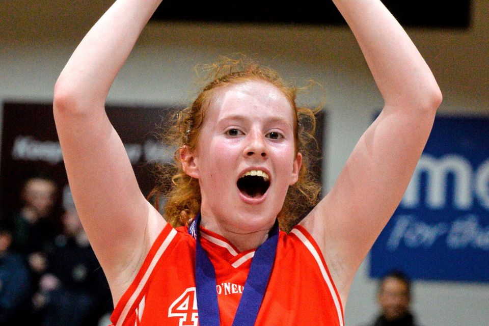 20 January 2015; Colaiste Chiarain Leixlip captain Sorcha Tiernan lifts the cup. All-Ireland Schools Cup U16A Girls Final, Colaiste Chiarain Leixlip v Gael Cholaiste Mhuire A.G, National Basketball Arena, Tallaght, Dublin. Picture credit: David Maher / SPORTSFILE
