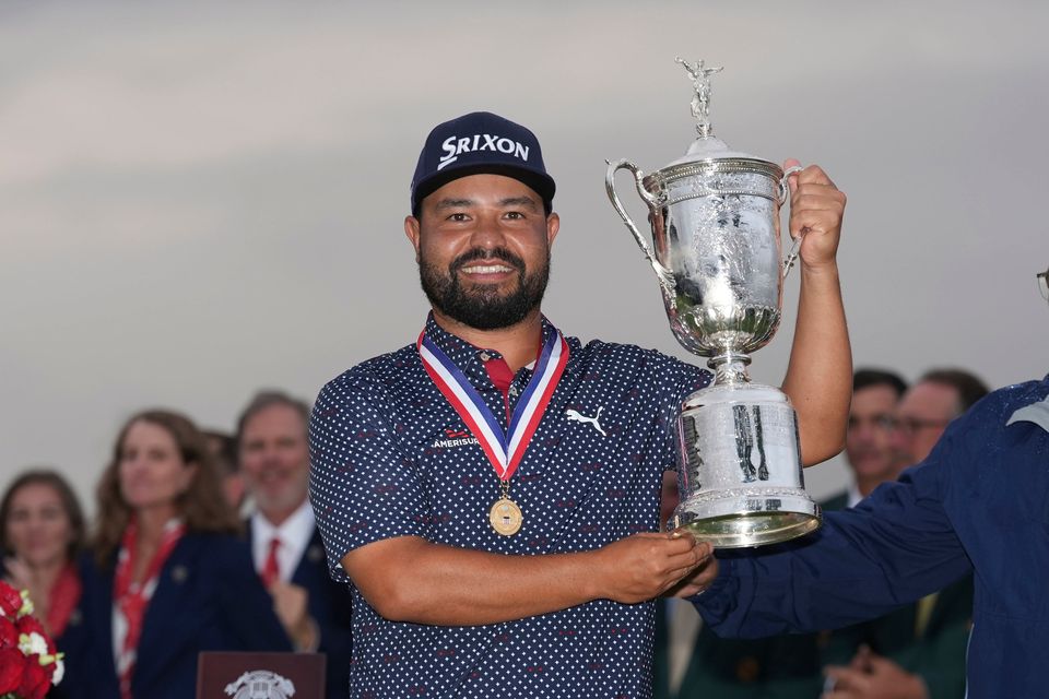 JJ Spaun celebrates with the trophy after winning the US Open at Oakmont Country Club. Photo: Seth Wenig/AP
