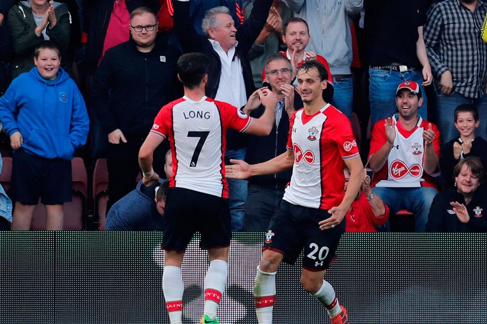 Southampton's Manolo Gabbiadini celebrates scoring their second goal with Shane Long