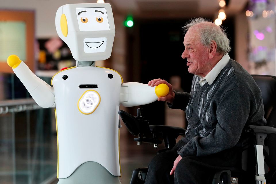 IrelandÕs first socially assistive AI robot 'Stevie II' from robotics engineers at Trinity College Dublin, with Brendan Crean, who helped trial the robot through the charity ALONE, during a special demonstration at the Science Gallery in Dublin.
Brian Lawless/PA Wire