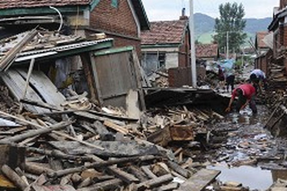Flood damage can be seen in Huadian City, in China's north-east following severe flooding (AP)