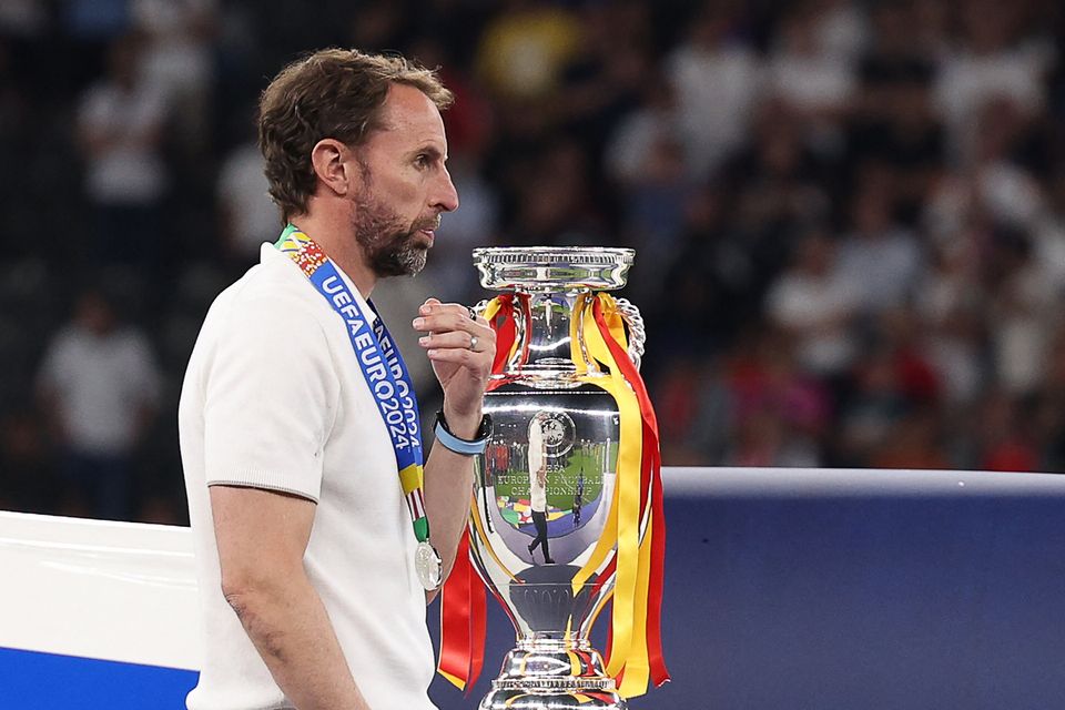 England boss Gareth Southgate walks past the trophy at the end of the Euro 2024 final against Spain at the Olympiastadion in Berlin last July. Photo: Adrian Dennis/AFP