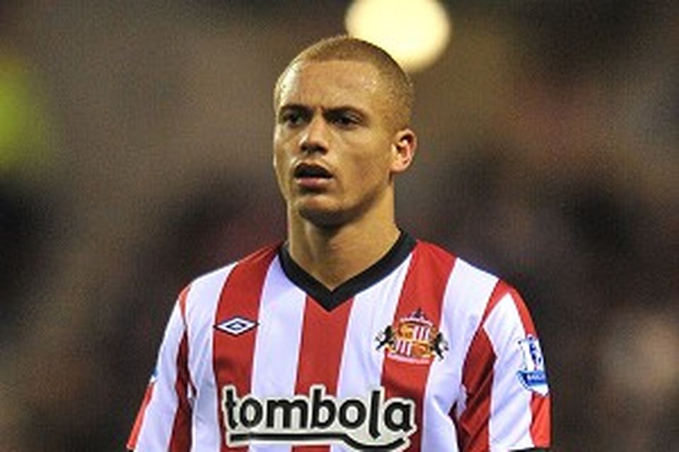 Former Manchester United player Wes Brown arrives for the world