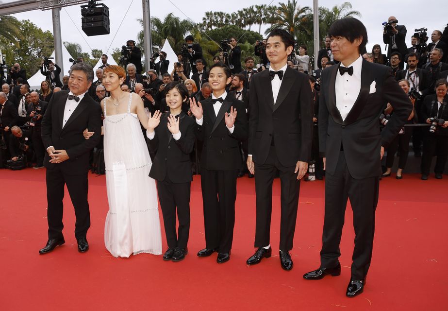 From left: director Hirokazu Koreeda, Sakura Ando, Hiiragi Hinata, Soya Kurokawa, Eita Nagayama, and Yuji Sakamoto arrive at the premiere of Monster (Joel C Ryan/Invision/AP)