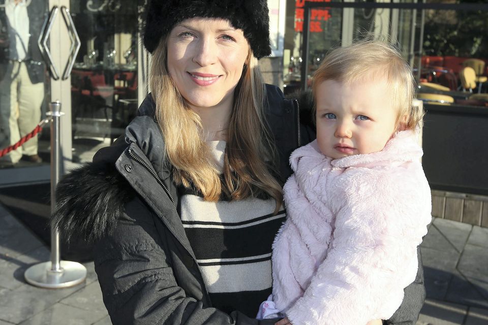 Cairenn Smyth and her daughter Ava (16 months) pictured outside Belluccis Italian Restaurant at Ballsbridge