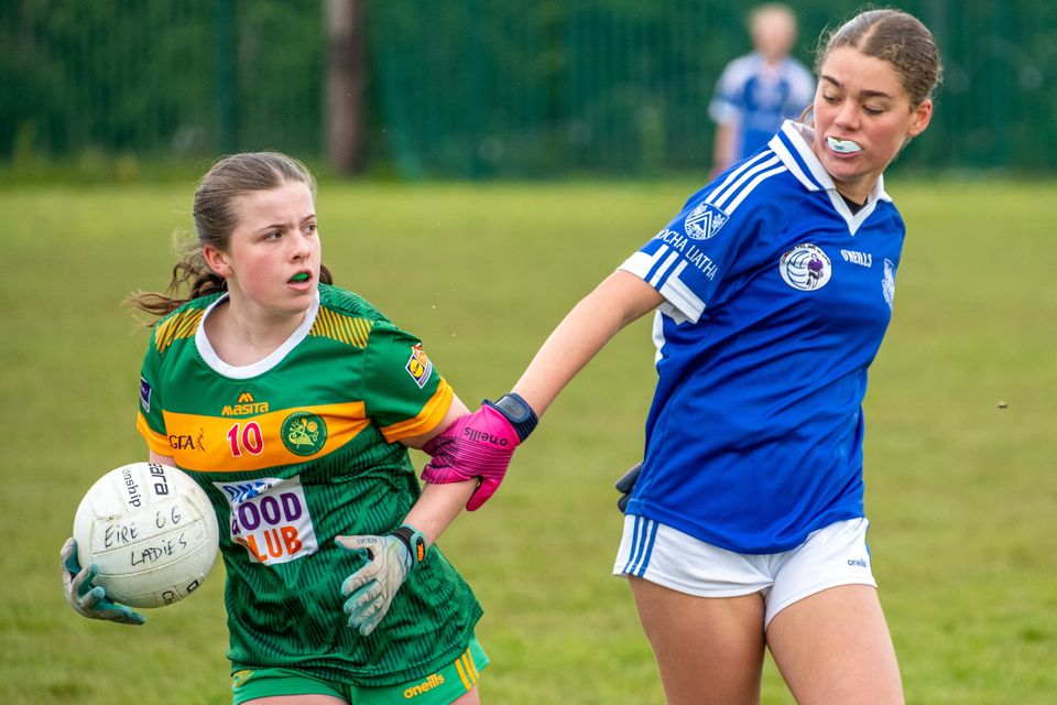 Issy Parker of Kilcoole looks to get away from Keela Rebello Lawless of Éire Óg Greystones. 