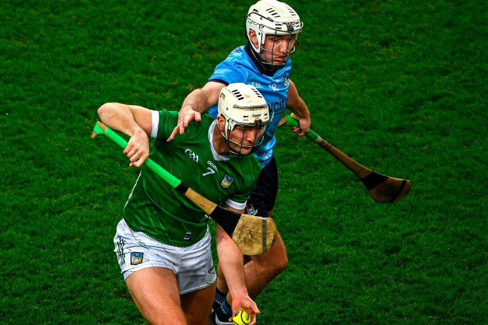 Kyle Hayes of Limerick is tackled by Darragh Power of Dublin during the Allianz Hurling League Division 1 match at Croke Park. Photo: Ray McManus/Sportsfile