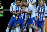 thumbnail: Kallum Higginbotham celebrates with team mates after his late equaliser from the penalty spot
