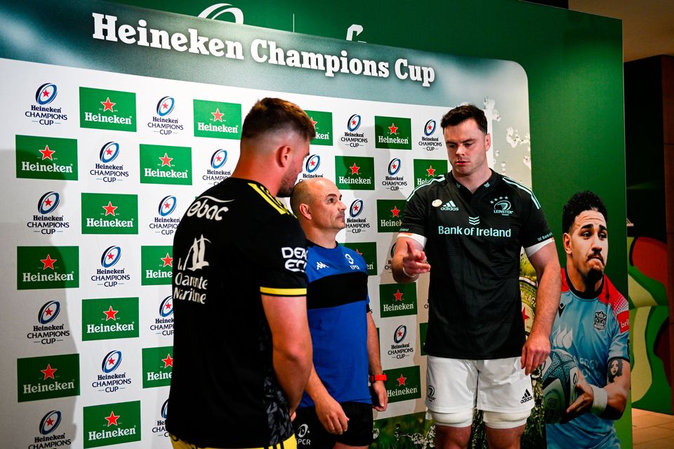 Team captains La Rochelle captain Grégory Alldritt, left, and Leinster captain James Ryan perform the coin toss in the company of referee Jaco Peyper before the Heineken Champions Cup Final match at Aviva Stadium in Dublin. Photo by Harry Murphy/Sportsfile