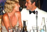 thumbnail: Best Actress winner Charlize Theron and boyfriend Stuart Townsend enjoy the moment at the 76th Annual Academy Awards Governors Ball at the Kodak Theatre on February 29, 2004