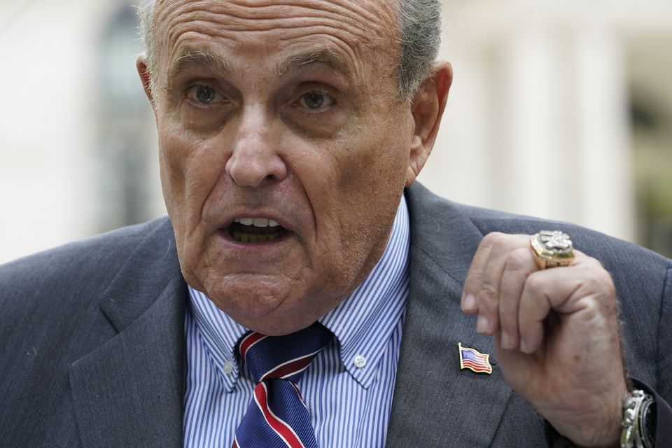 Rudy Giuliani is being sued for lost wages amid claims that he coerced a woman into sex (AP Photo/Mary Altaffer, File)