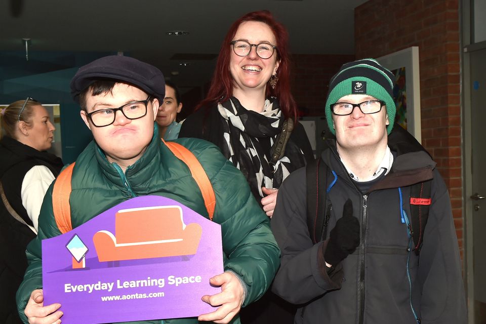 Daniel Sommer and Shane Kinsella pictured with artist Caoimhe Dunn at the opening of the art exhibition entitled 'Lightening up our everyday learning spaces' as part of the AONTAS Adult Learner Festival in the Gorey Institute of Further Learning and Training Centre on Thursday. Pic: Jim Campbell