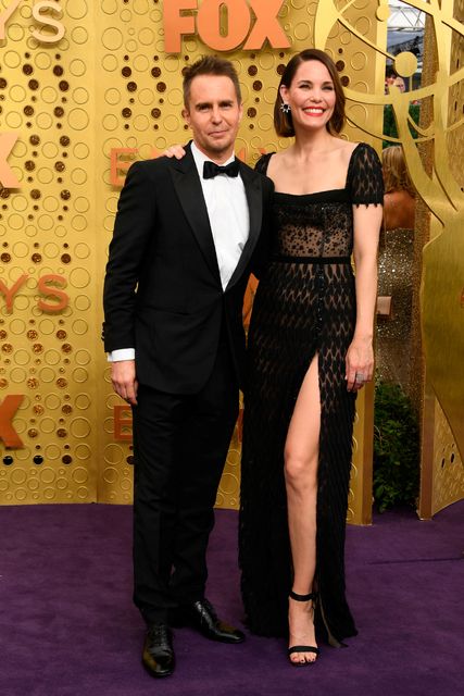 US actress Leslie Bibb (R) and husband US actor Sam Rockwell arrive for the 71st Emmy Awards at the Microsoft Theatre in Los Angeles on September 22, 2019. (Photo by VALERIE MACON / AFP)VALERIE MACON/AFP/Getty Images