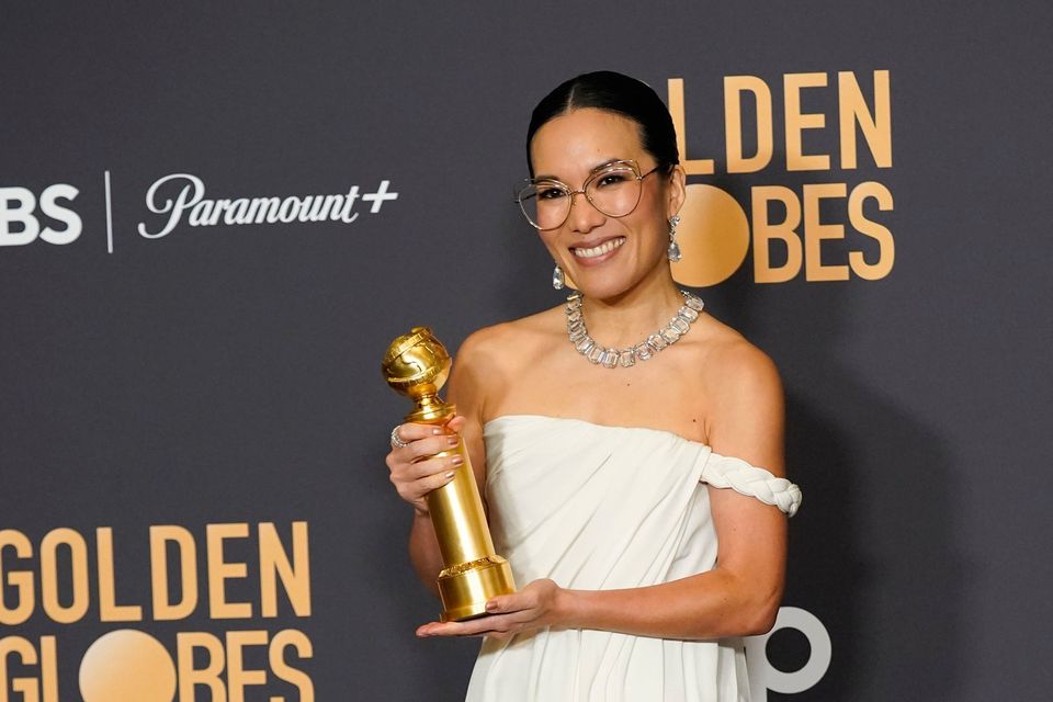 Ali Wong poses in the press room with the award for best performance by an actress in a limited series, anthology series, or a motion picture made for television for "Beef" at the 81st Golden Globe Awards on Sunday, Jan. 7, 2024, at the Beverly Hilton in Beverly Hills, Calif. (AP Photo/Chris Pizzello)