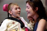 thumbnail: Friday, June 26, 2015: A very special group of 30 children from Belarus landed at Dublin Airport today (Friday, June 26th) as part of an urgent mercy mission by Adi Roches Chernobyl Children International (CCI) to airlift children out of the region and away from lethal forest fires for respite care in Ireland this summer. Pictured were Maryna Tsitova and Andrea Keogh from Kilkenny.  Picture Jason Clarke Photography.