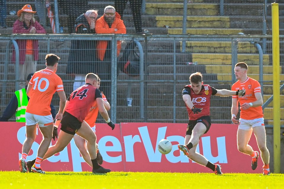 Ryan Johnston of Down shoots to score his side's second goal during the Ulster GAA Football Senior Championship semi-final