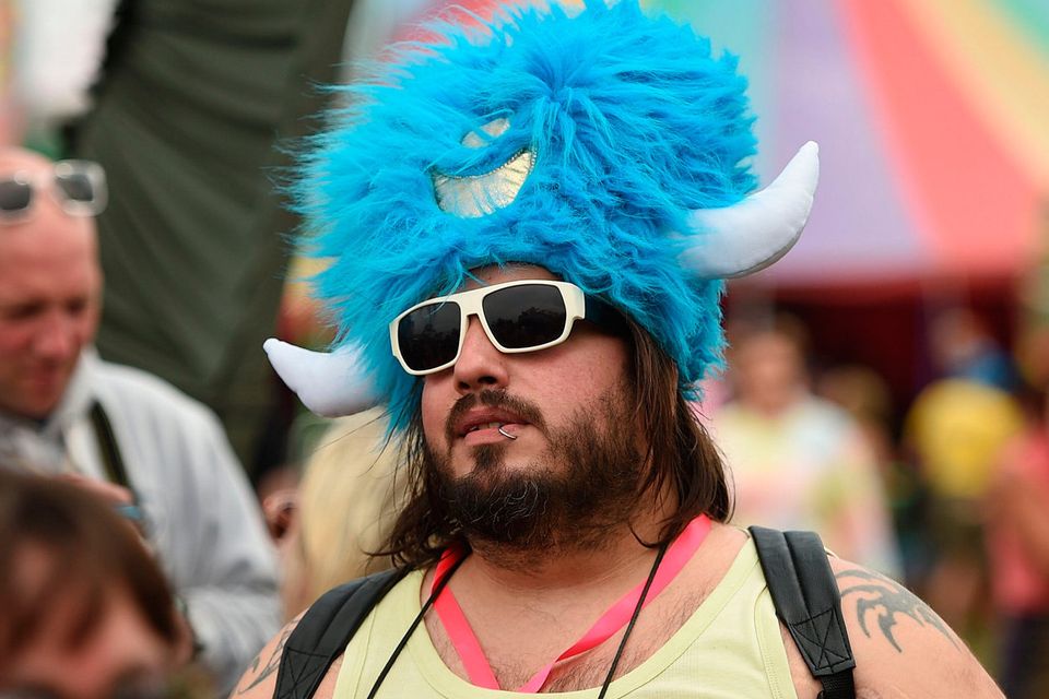 A reveller attends the Glastonbury Festival of Music and Performing Arts on Worthy Farm near the village of Pilton in Somerset, South West England, on June 26, 2019. (Photo by Oli SCARFF / AFP)OLI SCARFF/AFP/Getty Images