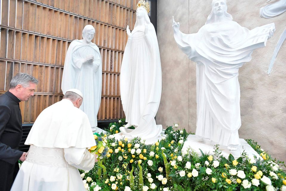 Pope Francis lays a wreath at the Knock Shrine in Knock, Ireland August 26, 2018. Vatican Media/Handout