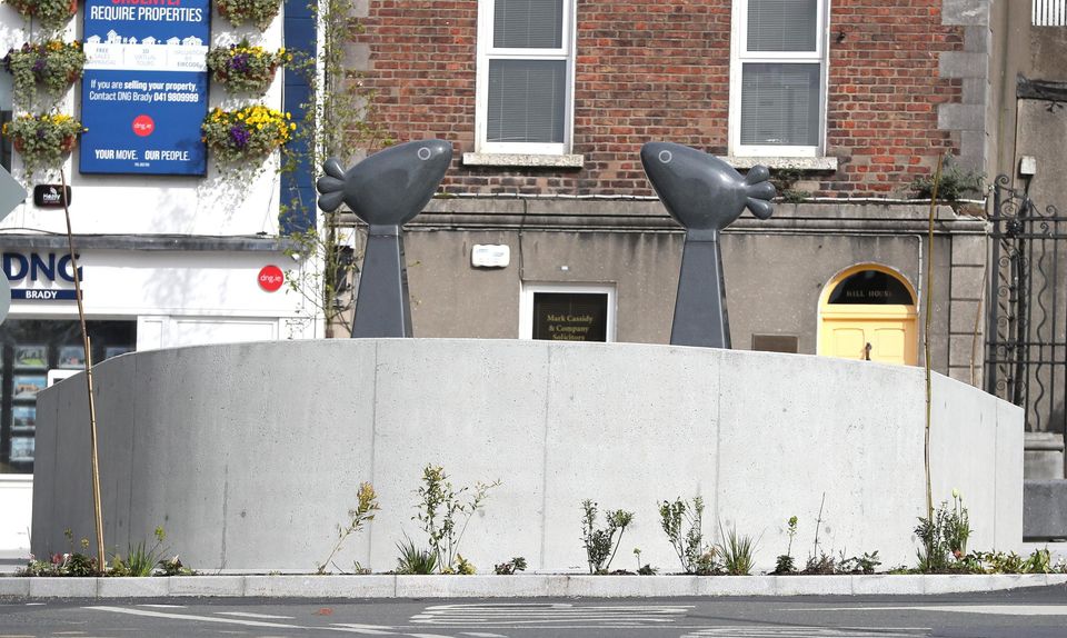 Get Tweeting! The birds chatter over the controversial wall at St Peter's Hill, Drogheda.