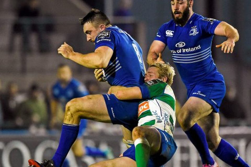 Leinster's Jack Conan is is tackled by Joe Carlisle of Treviso.