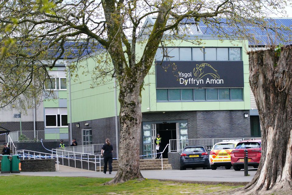 Police at Amman Valley school, in Ammanford (Ben Birchall/PA)