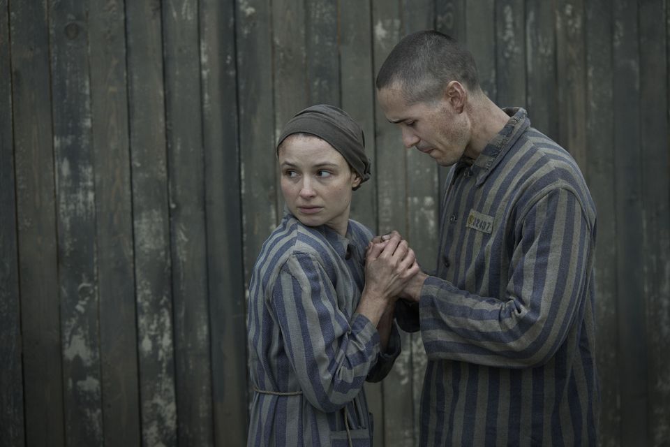 Jonah Hauer-King as Lali Sokolov & Anna Próchniak as Gita Furman in The Tattooist of Auschwitz. Photo: Martin Mlaka / Sky UK