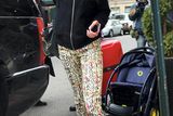 thumbnail: 4: Amal in bomber jacket and printed pants in New York.