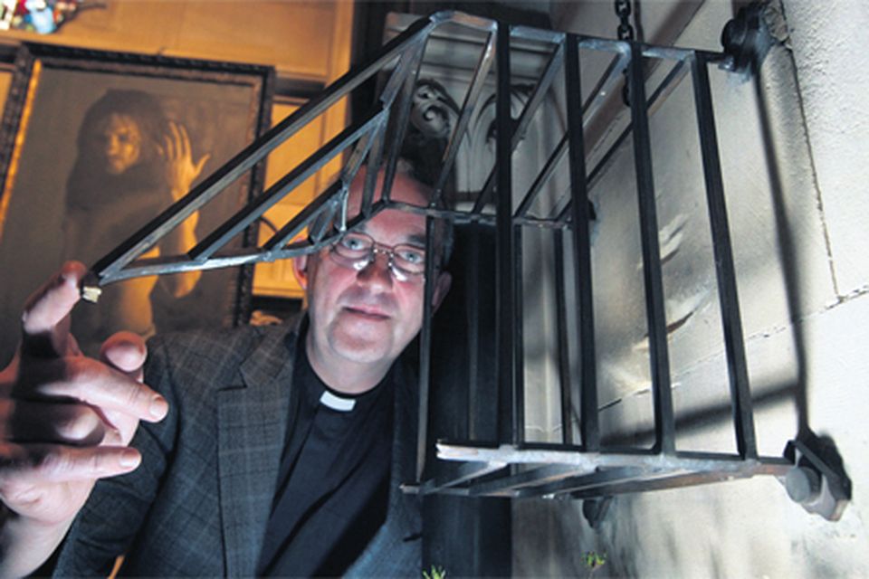 Reverend Dermot Dunne pictured at Christ Church Cathedral in Dublin showing where the wooden box which held the heart of St Laurence O'Toole was held before it was stolen