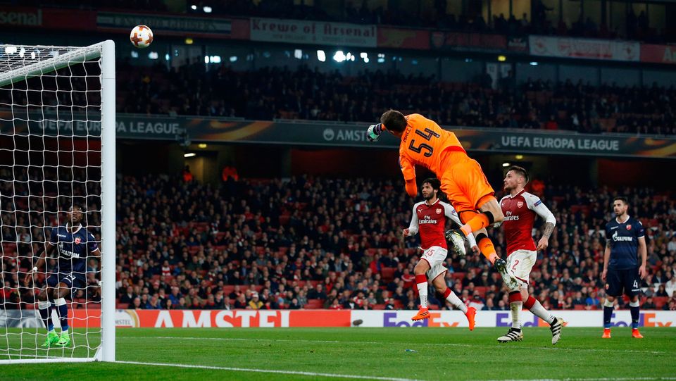 Arsenal's Matthew Macey saves a shot from Red Star Belgrade's Vujadin Savic. Photo: REUTERS/David Klein