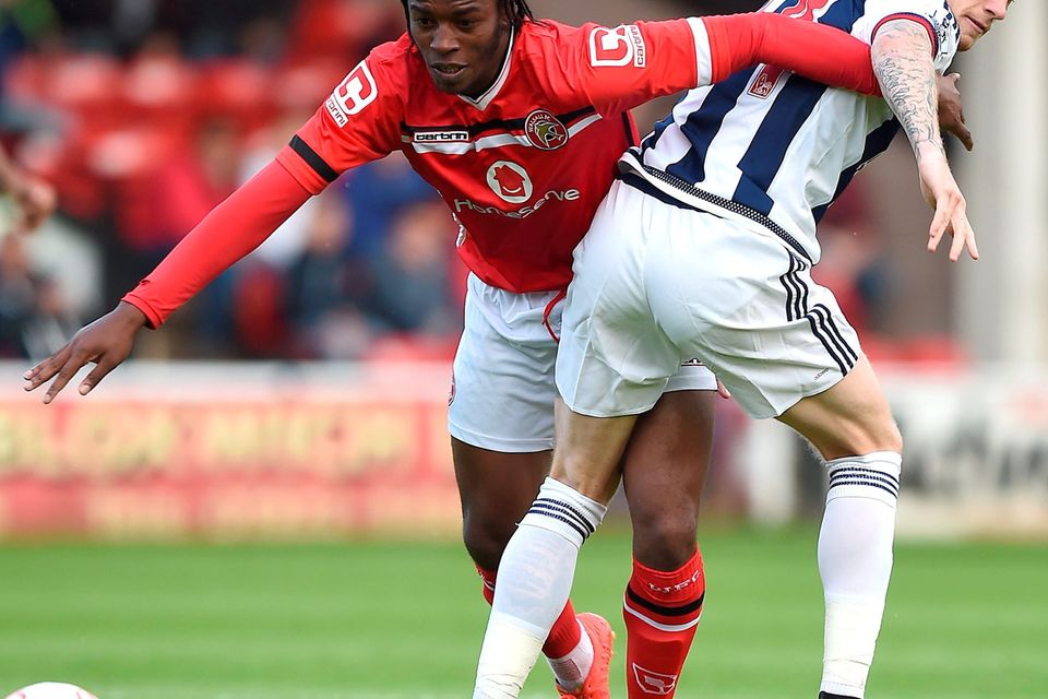 James McClean becomes entangled with Walsall’s Romaine Sawyers during a pre-season friendly last night