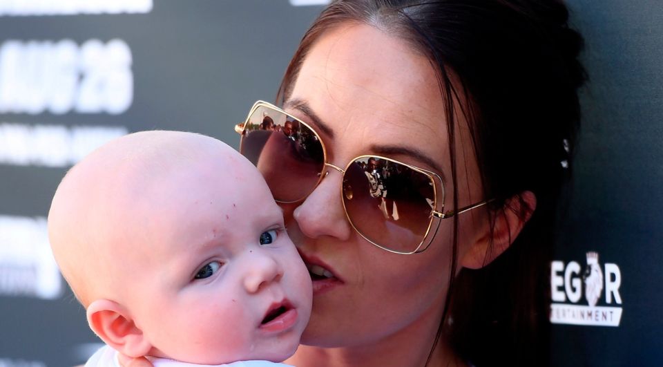 Dee Devlin and Conor McGregor Junior during the Grand Arrival at Toshiba Plaza in Las Vegas, USA