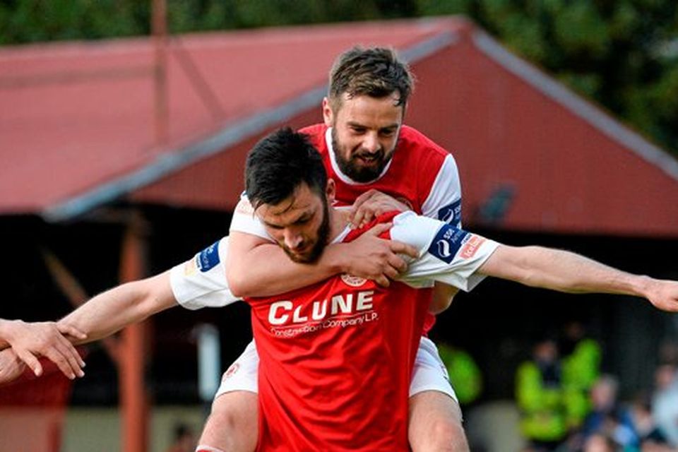St. Patrick's Athletic's Killian Brennan celebrates after scoring his side's third goal with team-mate Greg Bolger