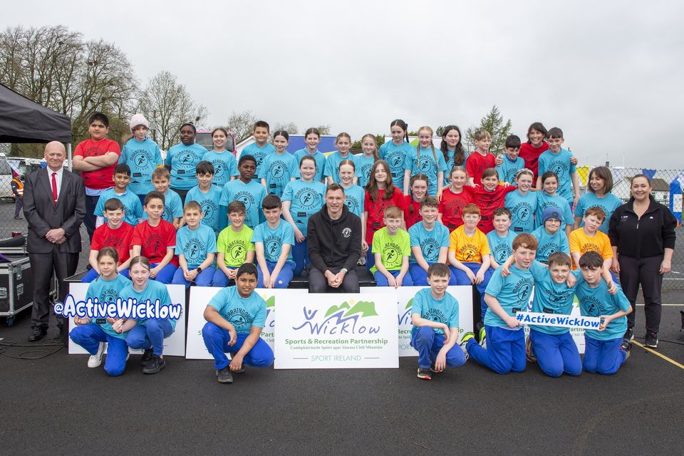 5th Class students from ?St. Mary's SNS, Blessington with Deputy CEO of Wicklow County Council Michael Nicholson, Aisling Hubbard, Co-ordinator with the Wicklow Sports & Recreation Partnership and Olympian David Gillick at the Marathon Kids Run in Ballymore Eustace GAA. Photo: Michael Kelly