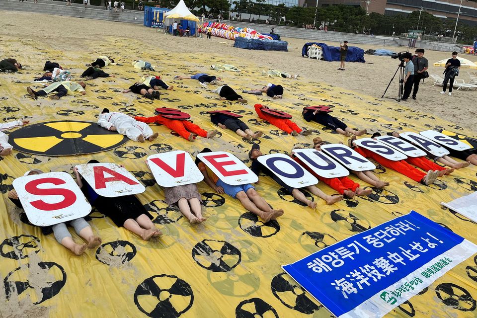 Activists take part in a protest against Japan releasing treated radioactive water into the Pacific Ocean, in Busan, South Korea yesterday.    Photo: Minwoo Park/Reuters