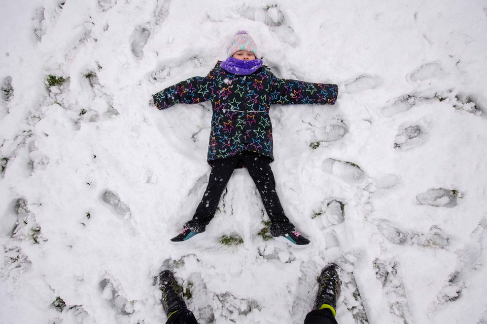 Playing at snow angels in Tralee. Photo: Domnick Walsh