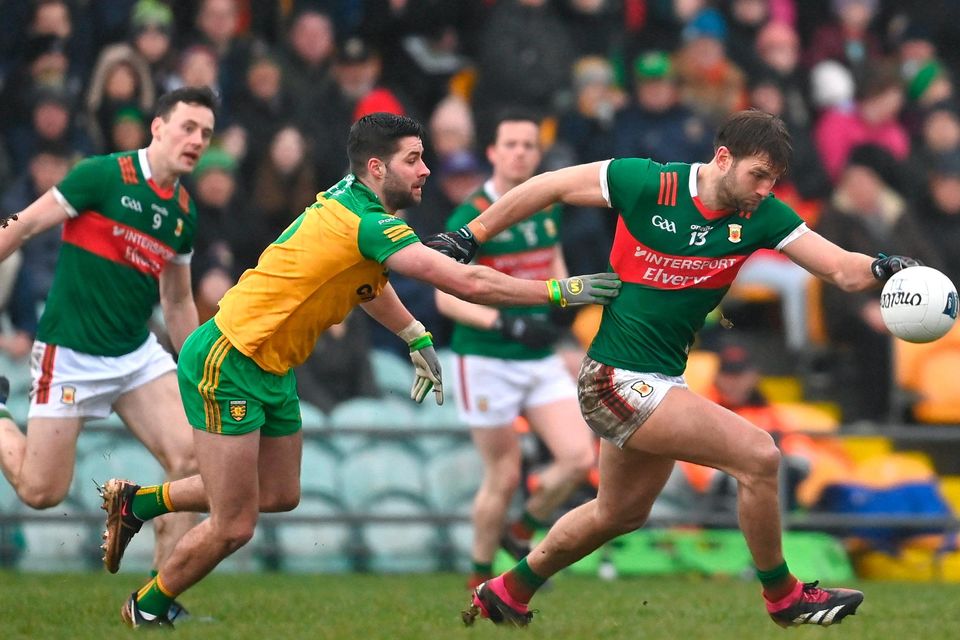 Aidan O'Shea of Mayo in action against Stephen McMenamin of Donegal during the Division 1 match at MacCumhaill Park in Ballybofey, Donegal. Photo by Ramsey Cardy/Sportsfile